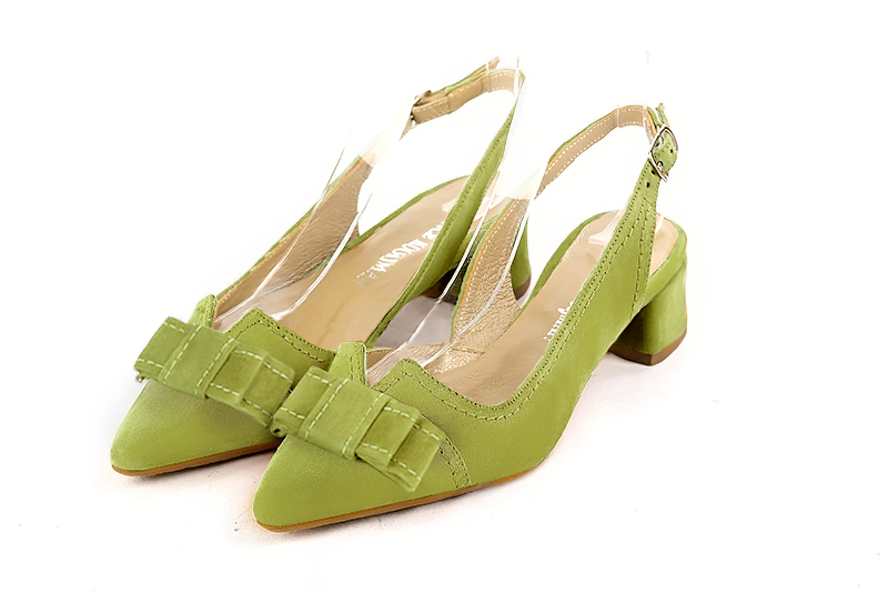 Pistachio green women's open back shoes, with a knot. Tapered toe. Low flare heels. Front view - Florence KOOIJMAN